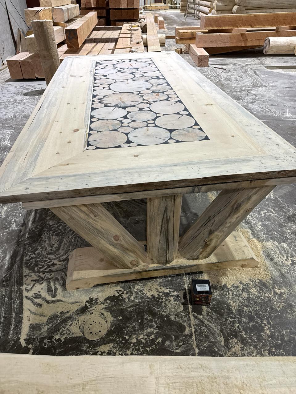 Hand-built log table with a log-end inlay